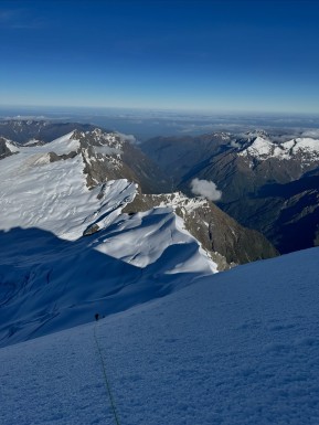 Mount Sefton
An alpine start from our tent camp, weaving through crevasses on the Douglas Glacier as first light crept in. A cold southerly breeze on the NW Ridge, firm frozen snow underfoot, and the western side of the Main Divide stretching north in perfect clarity — Aoraki front and centre.
Quick glacier travel in crisp conditions, then slow, deliberate footwork across the summit ice cap, glassy sastrugi demanding full attention. Nine pitches on solid anchors to round out a proper alpine climb.
Sefton doesn’t get guided often; conditions and weather need to align perfectly, the walk-in access is long and difficult — even fly-in access is no guarantee, as weather can change quickly and you’re exposed to the elements.
A great day out with Nina on a beautiful, understated peak. She’d had Mount Sefton in her sights for a long time — and after plenty of planning, patience, and reshuffling, we managed to achieve her dream.
📸 @elke_mountain_guide
#MountSefton #SouthernAlps #AorakiMountCook #NewZealandAlps #Mountaineering #AlpineClimbing #NZMountains #MainDivide #DouglasGlacier #AlpineStart #Alpinism #Crampons #IceAxe #Sastrugi #GlacierTravel #ClimbNZ #MountainAdventure #AlpineRecreation #NZMGA #WeAreIFMGA #GuideLife - Mount Sefton An alpine start from our tent camp, weaving through crevasses on the Douglas Glacier as first light crept in. 3